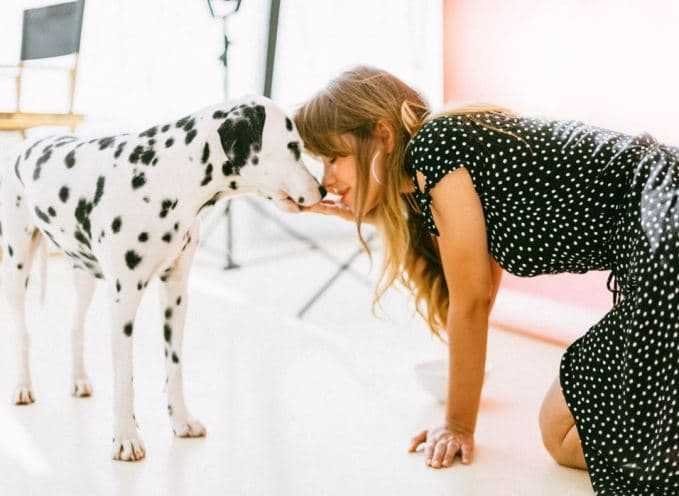 Women Kissing a Dog  - Hypoallergenic Dogs Breeds